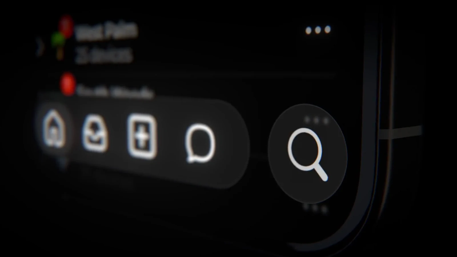 A close-up of a phone's tab bar with shallow depth of field.