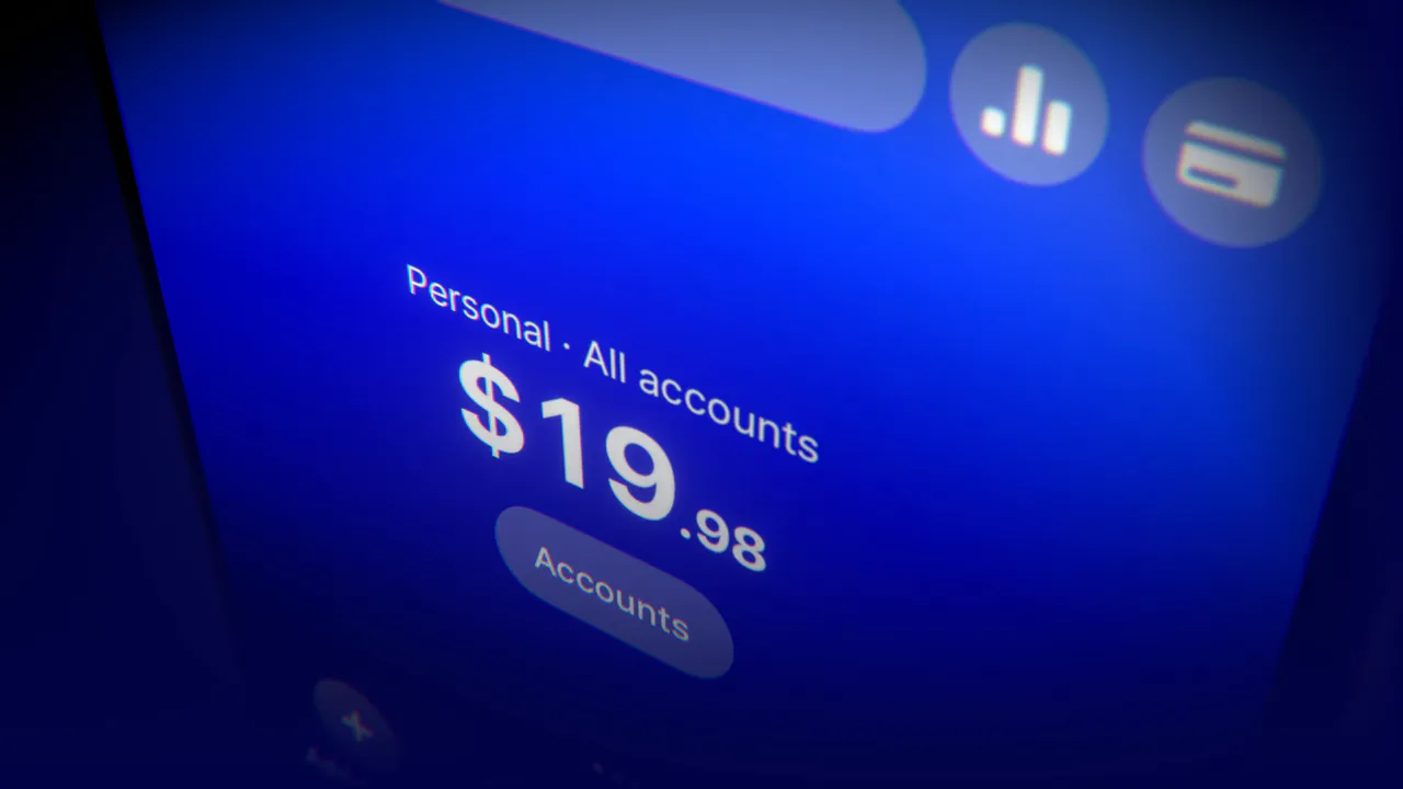 A close-up of $19.98 on a tilted phone screen.